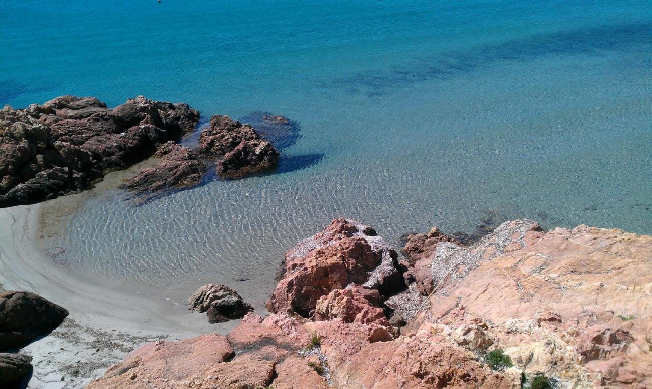 Casetta al mare Isola Rossa Esterno foto